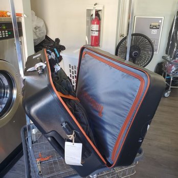 Coast Coin Laundry - my bag full of laundry clothes on a rack that was specifically mine when i was using the laundry - Laundromat Near Me - Costa Mesa, California