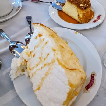 Churrasqueira Bairrada Restaurant - Molotoff dessert (egg white meringue like fluff) - Portuguese Near Me - Mineola, New York Churrasqueira Bairrada Restaurant - Molotoff dessert (egg white meringue like fluff) - Portuguese Near Me - Mineola, New York