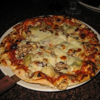 Cafe Borgia - pizza with prosciutto, artichokes, mushrooms, and black olives - Italian Near Me - Munster, Indiana