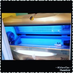Island Tan - 15 min Sunbed w/ Facial tanners