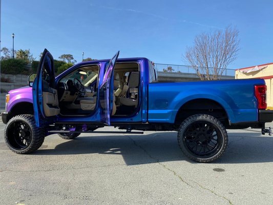 Full Wrap on a f250 with door jams - This is a complete vinyl wrap install on a lifted Ford F250. We installed LEDf250 fender inserts. Also completed Stars In The Ceiling.. customer requested door jams as well. Full Wrap on a f250 with door jams - This is a complete vinyl wrap install on a lifted Ford F250. We installed LEDf250 fender inserts. Also completed Stars In The Ceiling.. customer requested door jams as well.
