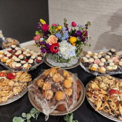 Woodland Warner Flowers - Blue hydrangeas, red anemonies, yellow straw flower, pink ranunculus, tulips, stock and so much more...