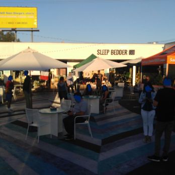The BLVD Market - people walking and sitting under umbrellas - Food Stands Near Me - San Diego, California The BLVD Market - people walking and sitting under umbrellas - Food Stands Near Me - San Diego, California