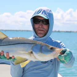 Winter Park Flyfisher - Fly shop owner, Jeff Ehlert, with a Snook caught near Tarpon Caye Lodge on one of our Hosted Trips to Belize.
