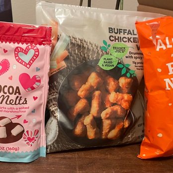 Trader Joe's - 02/11/2023 TJs finds: hot cocoa hearts, plant based buffalo chicken wings, and almond butter pretzel nuggets - Three Trader Joe's snack bags are displayed: hot cocoa hearts, buffalo chicken bites, and almond butter pretzel nuggets. - Grocery Near Me - Concord, California
