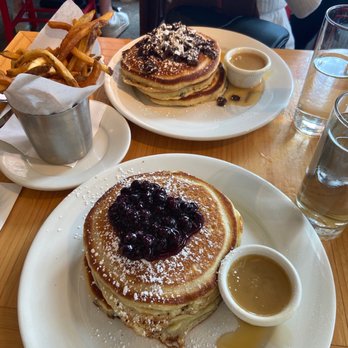 Clinton St. Baking - Wild Maine Blueberry Pancakes with Warm Maple Butter, Chocolate Chunk Pancakes with Warm Maple Butter, and Hand Cut Fries - Bakeries Near Me - New York, New York