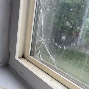 Deerwoods Management - Cracked window - Property Management Near Me - Denver, Colorado Deerwoods Management - Cracked window - Property Management Near Me - Denver, Colorado