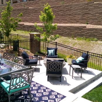 D&R Finishing Touch - a patio with a table and chairs - Landscaping Near Me D&R Finishing Touch - a patio with a table and chairs - Landscaping Near Me