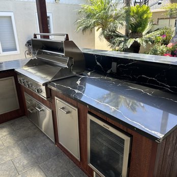 AP Stone Countertops - Barbecue island countertop. Black Calcutta engineered quartz - Countertop Installation Near Me - Long Beach, California AP Stone Countertops - Barbecue island countertop. Black Calcutta engineered quartz - Countertop Installation Near Me - Long Beach, California