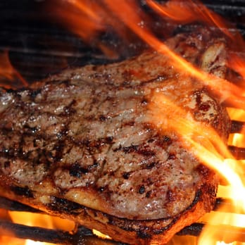 The Meat Block - a steak on the grill - Meat Shops Near Me - Muskegon, Michigan The Meat Block - a steak on the grill - Meat Shops Near Me - Muskegon, Michigan