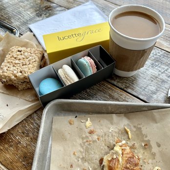 Lucettegrace - Pictured here is their Ham and Cheese croissant, an Americano, macarons, and a brown butter Rice Krispie treat! - Coffee & Tea Near Me - Raleigh, North Carolina Lucettegrace - Pictured here is their Ham and Cheese croissant, an Americano, macarons, and a brown butter Rice Krispie treat! - Coffee & Tea Near Me - Raleigh, North Carolina