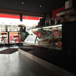 Lunchi - The dark interior and sandwich counter.