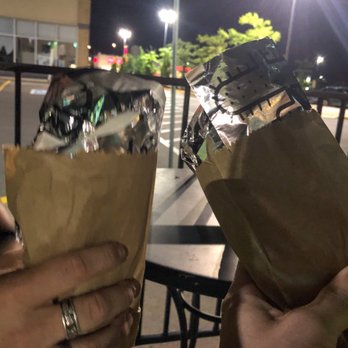 BarBurrito - St Catherines - two people holding bags of food - Fast Food Near Me - St Cathrines, Ontario BarBurrito - St Catherines - two people holding bags of food - Fast Food Near Me - St Cathrines, Ontario