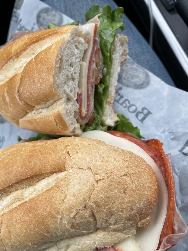 Sundays Plus Delicatessen Logo