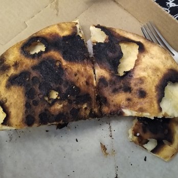 MOD Pizza - The bottom of the mini pizza. The bits that are missing were also black and crumbled when they were touched. Worst pizza ever. - Fast Food Near Me - Kent, Washington MOD Pizza - The bottom of the mini pizza. The bits that are missing were also black and crumbled when they were touched. Worst pizza ever. - Fast Food Near Me - Kent, Washington