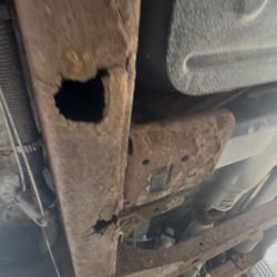 Don's Auto Sales - Frame rust through holes