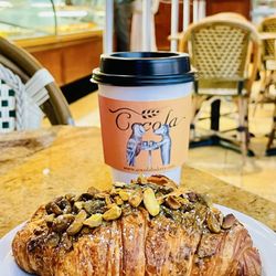 Pistachio croissant with my small cup banana hot chocolate