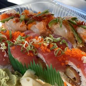 Sushi Hanabi - Hole in one (top) and red dragon (bottom near wasabi/ginger) - Japanese Near Me - Pleasanton, California Sushi Hanabi - Hole in one (top) and red dragon (bottom near wasabi/ginger) - Japanese Near Me - Pleasanton, California