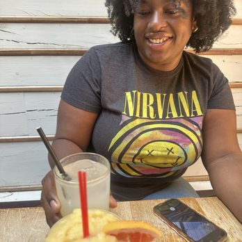 Sisters - Celebrating the Aries! The frozen drink, is the "frozen of the day".  The drink with black straw is the Crystal Lizard with Gin. - Music Venues Near Me - Brooklyn, New York