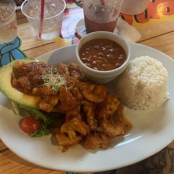 Buena Vibra - Aguacate Relleno de Pollo Nory I think it was called? Stuffed avocado with the chicken in tomato sauce. - Caribbean Near Me - Cabo Rojo, Puerto Rico