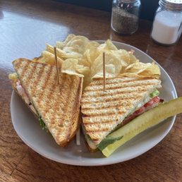 Chicken Pesto Panini with kettle chips and pickle Chicken Pesto Panini with kettle chips and pickle