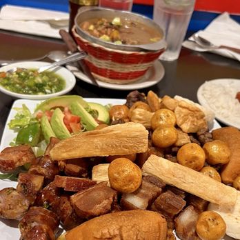 Donde Adela Colombian Restaurant - Picada (Chicharrón, chorizo, morcilla, yucca, arepa, empanada, carne asada, Patacón y papa criolla) & Beef Empanadas - Colombian Near Me - Orange, California