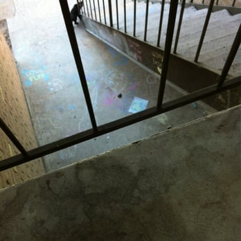 Baybrook Village - Kid's chalk graffiti is great but not all over the building. Oh look- a stray cat!!! - Apartments Near Me - Webster, Texas
