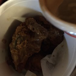 KFC - She didn't offer to replace it my mom has gravy all over her sweatshirt and her shirt and my truck