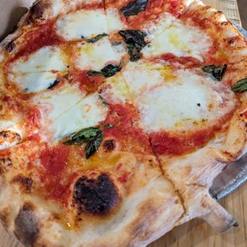 Pizzeria Mercato - Margherita pizza. $14. Tomato, fior di latte, basil, EVOO. - Pizza Near Me - Carrboro, North Carolina Pizzeria Mercato - Margherita pizza. $14. Tomato, fior di latte, basil, EVOO. - Pizza Near Me - Carrboro, North Carolina