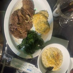 Breakfast Ribeye, Cheesy Cajun Grits, Sautéed Spinach, Shredded Potato Casserole