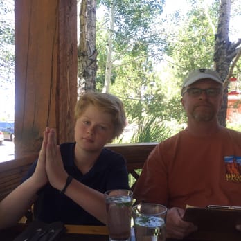 Hell's Backbone Grill & Farm - Eating on the porch, great breeze. - American Near Me - Boulder, Utah Hell's Backbone Grill & Farm - Eating on the porch, great breeze. - American Near Me - Boulder, Utah