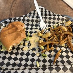 Top Gun Steak & Burger - Camera did not eat first. Burger and poutine