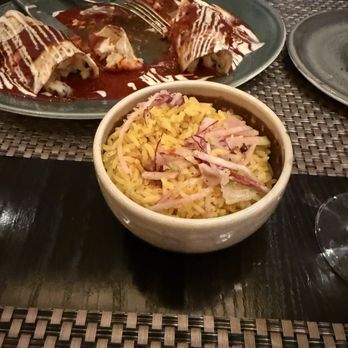Bistro Mariposa - Seafood enchiladas and saffron rice. Absolutely delicious!! The flavors are out of control amazing! - Mexican Near Me - Black Hawk, Colorado