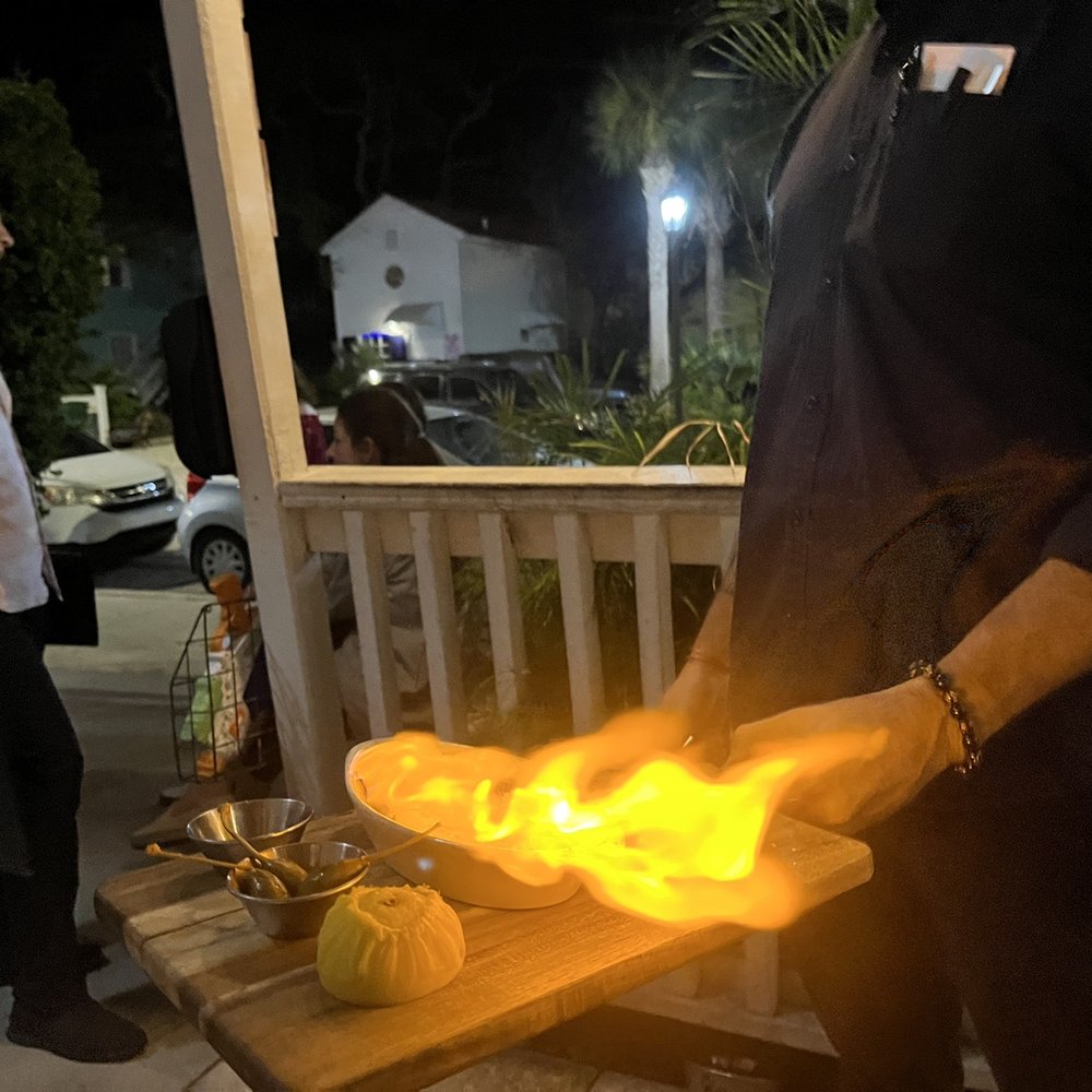 Santiago's Bodega - Saganaki in action - Tapas Bars Near Me - Key West, Florida Santiago's Bodega - Saganaki in action - Tapas Bars Near Me - Key West, Florida