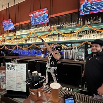Mercado Gonzalez - Bar - Halloween 2025 - one of the bartenders in a luchador costume. Fun! - Mexican Near Me - Costa Mesa, California