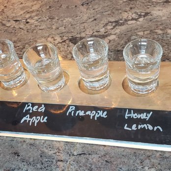 Carefree Spirits Distillery - five glasses of alcohol lined up on a board - Distilleries Near Me - Cave Creek, Arizona