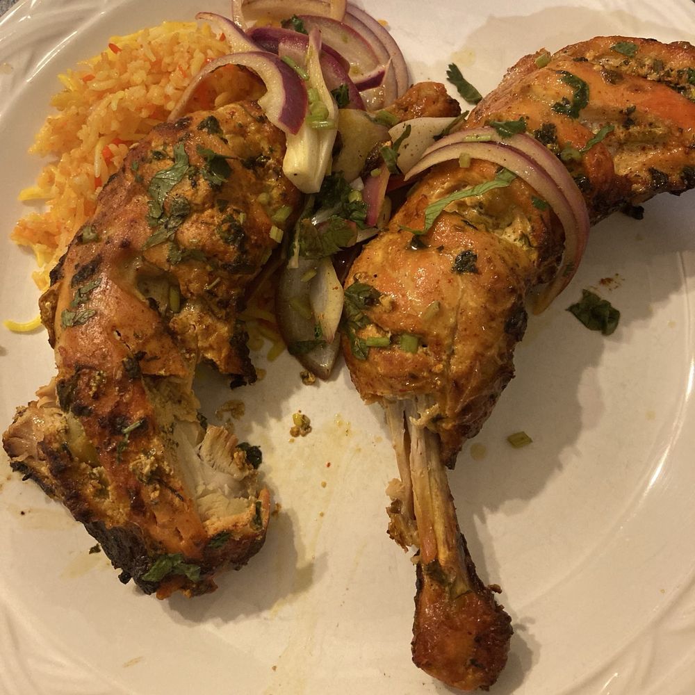 Tandoori chicken One and Only Tandoori Kukkad and Masala Rice with no masala flavor just turmeric rice Tandoori chicken One and Only Tandoori Kukkad and Masala Rice with no masala flavor just turmeric rice