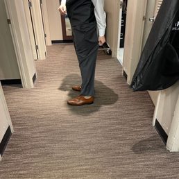 Groomsman's pants that were several sizes too big. Groomsman's pants that were several sizes too big.