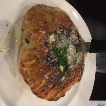 Carlucci’s Grill - Puff bread comes with the meal. - Italian Near Me - Yardley, Pennsylvania Carlucci’s Grill - Puff bread comes with the meal. - Italian Near Me - Yardley, Pennsylvania