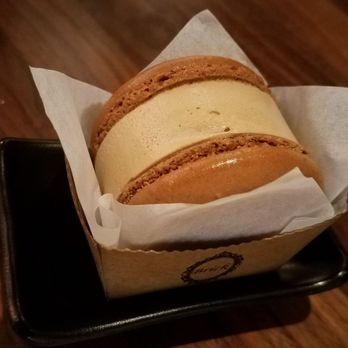 Sapporo Sushi - Cappuccino Macaron dessert. Smaller than it looks, about 2 inch round, just right for me. Luscious! - Japanese Near Me - Long Beach, California