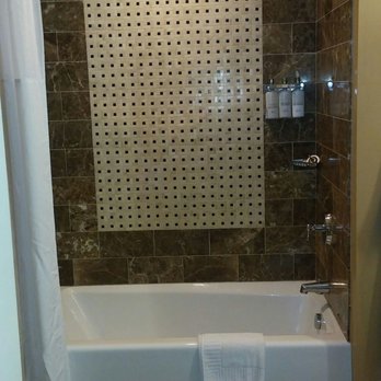 Kimpton Hotel Monaco Baltimore Inner Harbor - Shower and tub - Hotels Near Me - Baltimore, Maryland