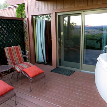 Sedona Views Bed & Breakfast - Patio with chaise loungers and the hot tub - Bed & Breakfast Near Me - Sedona, Arizona