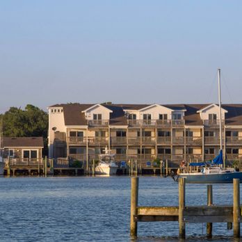 Captain's Landing Waterfront Inn - The hotel was meant to emulate an earlier island hotel, the Ponzer. - Hotels Near Me - Ocracoke, North Carolina Captain's Landing Waterfront Inn - The hotel was meant to emulate an earlier island hotel, the Ponzer. - Hotels Near Me - Ocracoke, North Carolina