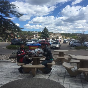 McDonald's - two men sitting at a picnic table - Fast Food Near Me - Estes Park, Colorado
