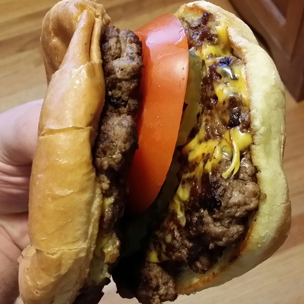 Gray's Cafe - A thick double cheeseburger - Cafes Near Me - Adrian, Missouri