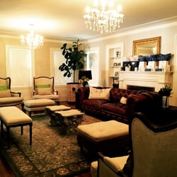 THE LOUNGE. A big living space, surrounded by elegant furniture and intricate details.