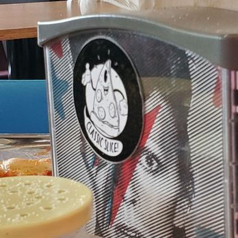 Classic Slice - Bowie & "Shake & Bake" in the background - Pizza Near Me - Milwaukee, Wisconsin Classic Slice - Bowie & "Shake & Bake" in the background - Pizza Near Me - Milwaukee, Wisconsin
