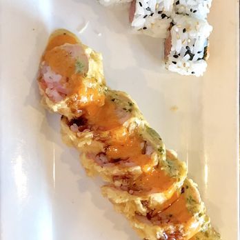 Sushi UNI - Spicy tuna crunch roll. Dinosaur roll-tempura fried with 3 unique sauces. - Sushi Bars Near Me - Lenexa, Kansas