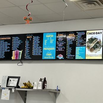 Isla Cancun - a menu on the wall - Juice Bars & Smoothies Near Me - Locust, North Carolina