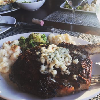 Del Frisco's Double Eagle Steakhouse - Bone in ribeye, lobster Mac and cheese, gnocchi and Brussel sprouts. Topping was blue cheese... Still dreaming of this meal. Shall return - Steakhouses Near Me - Washington, DC, District of Columbia